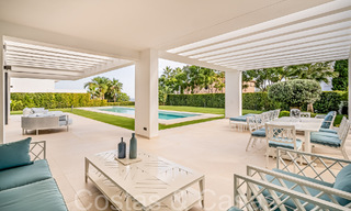 Lista para entrar a vivir, nueva villa moderna en venta en un resort de golf de cinco estrellas en Marbella - Benahavis 71745 