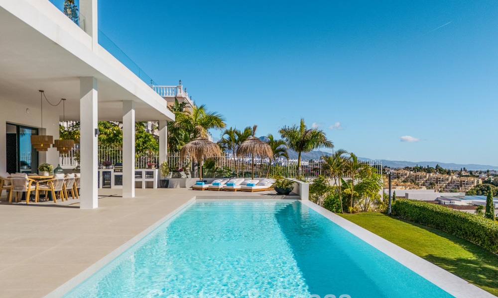 Exclusiva villa de diseño con vistas panorámicas al mar en venta en un resort de golf de cinco estrellas en Marbella - Benahavis 74766