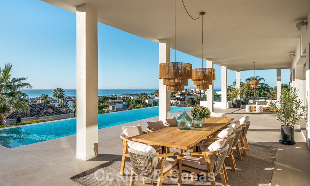 Exclusiva villa de diseño con vistas panorámicas al mar en venta en un resort de golf de cinco estrellas en Marbella - Benahavis 74776