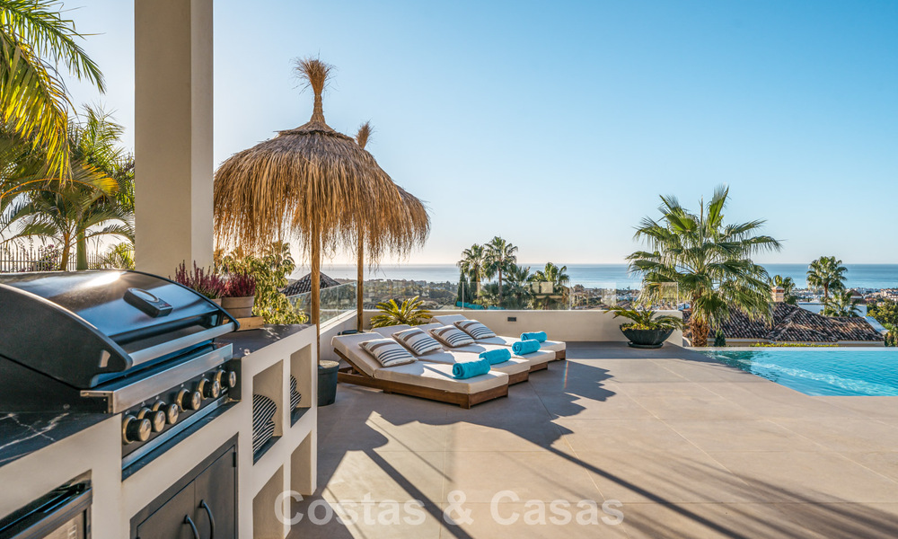 Exclusiva villa de diseño con vistas panorámicas al mar en venta en un resort de golf de cinco estrellas en Marbella - Benahavis 74777