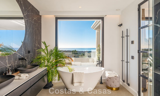 Exclusiva villa de diseño con vistas panorámicas al mar en venta en un resort de golf de cinco estrellas en Marbella - Benahavis 74782 