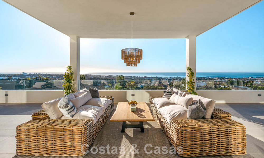 Exclusiva villa de diseño con vistas panorámicas al mar en venta en un resort de golf de cinco estrellas en Marbella - Benahavis 74785