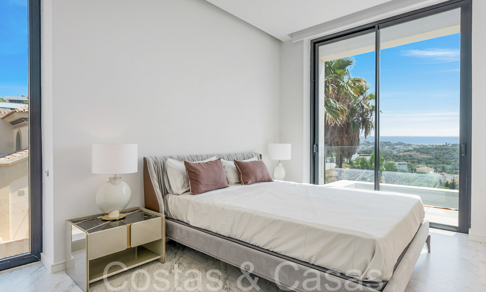 Nueva villa de diseño modernista en venta con impresionantes vistas al mar en prestigioso resort de golf en Marbella - Benahavis 68472