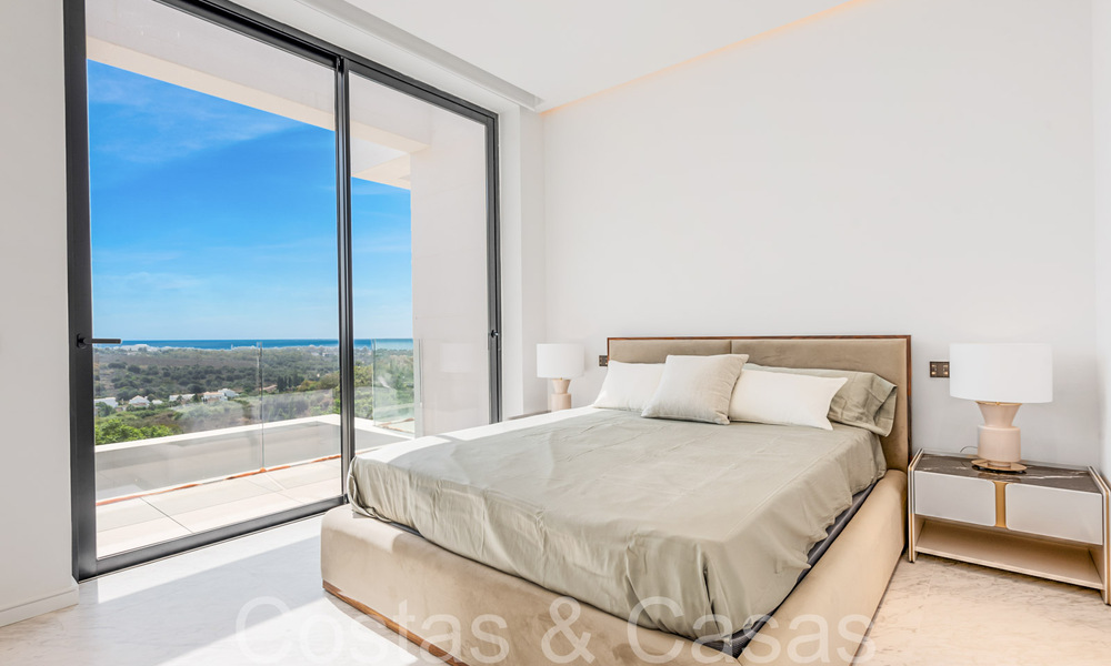 Nueva villa de diseño modernista en venta con impresionantes vistas al mar en prestigioso resort de golf en Marbella - Benahavis 68476