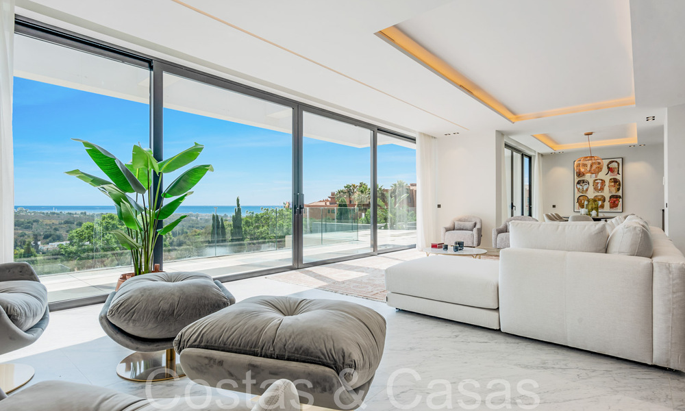 Nueva villa de diseño modernista en venta con impresionantes vistas al mar en prestigioso resort de golf en Marbella - Benahavis 68481