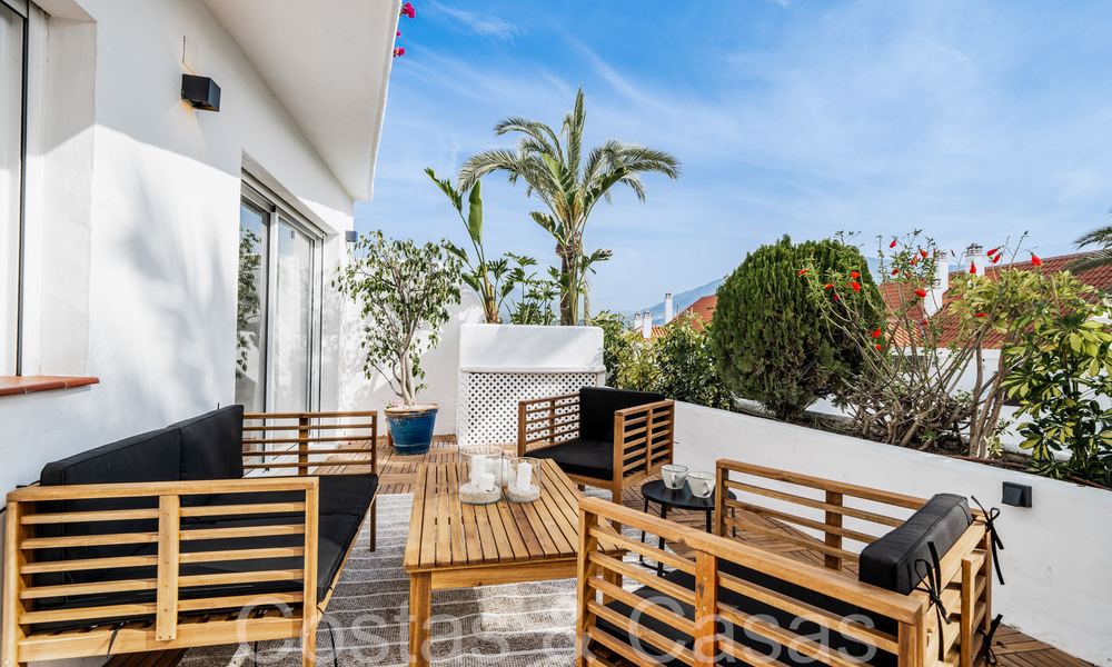 Lujoso apartamento de 4 dormitorios en venta en una urbanización cerrada en Nueva Andalucía, Marbella 68739