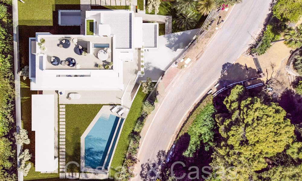 Villa nueva con diseño contemporáneo en venta en la exclusiva Cascada de Camojan en la Milla de Oro de Marbella 71318