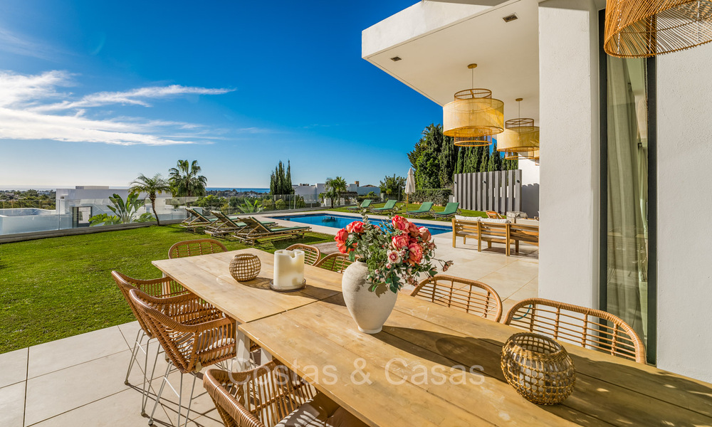 Villa modernista de lujo en venta con vistas panorámicas al mar en una zona exclusiva de Benahavis - Marbella 74431